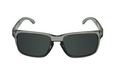 Sunglasses with dark lenses and transparent frame on a white background
