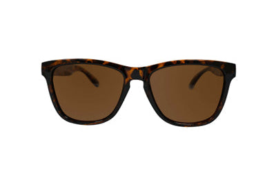 Sunglasses with tortoiseshell frame and brown lenses on a white background